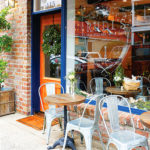 rudi’s-old-village-wine-shop-storefront-cafe-chairs